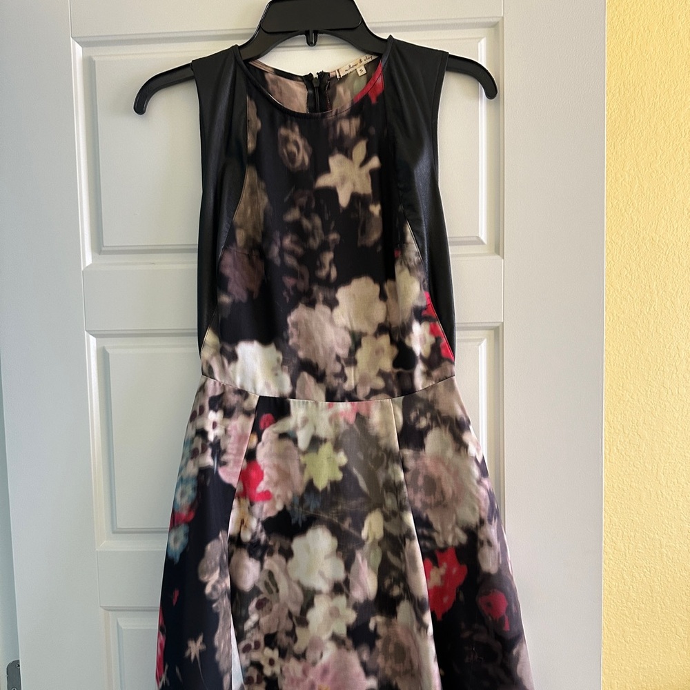 Soft fabric and faux leather dress